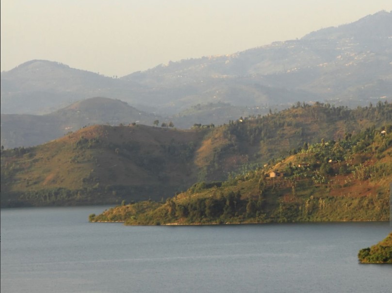 Stunning view of Rwandaâ€™s lush landscapes and sustainable eco-lodges, showcasing the countryâ€™s commitment to eco-tourism