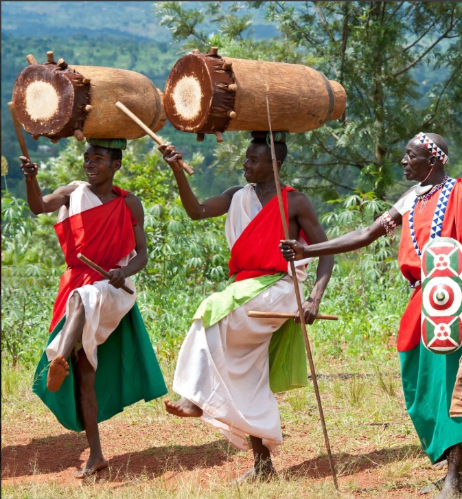 Traditional Rwandan dance performance showcasing vibrant culture, music, and heritage in a cultural village setting.