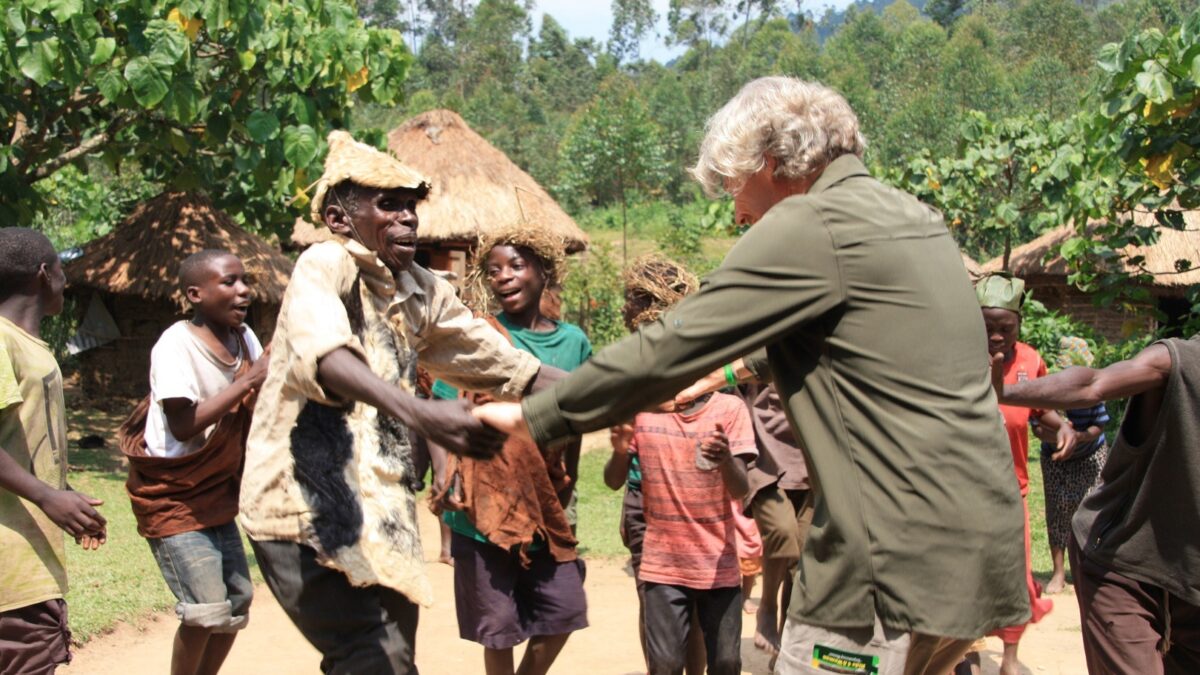 How do I greet locals in Luganda?