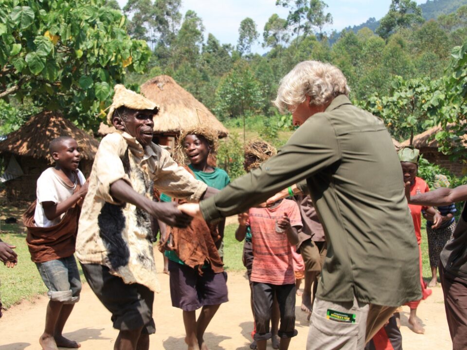 How do I greet locals in Luganda?