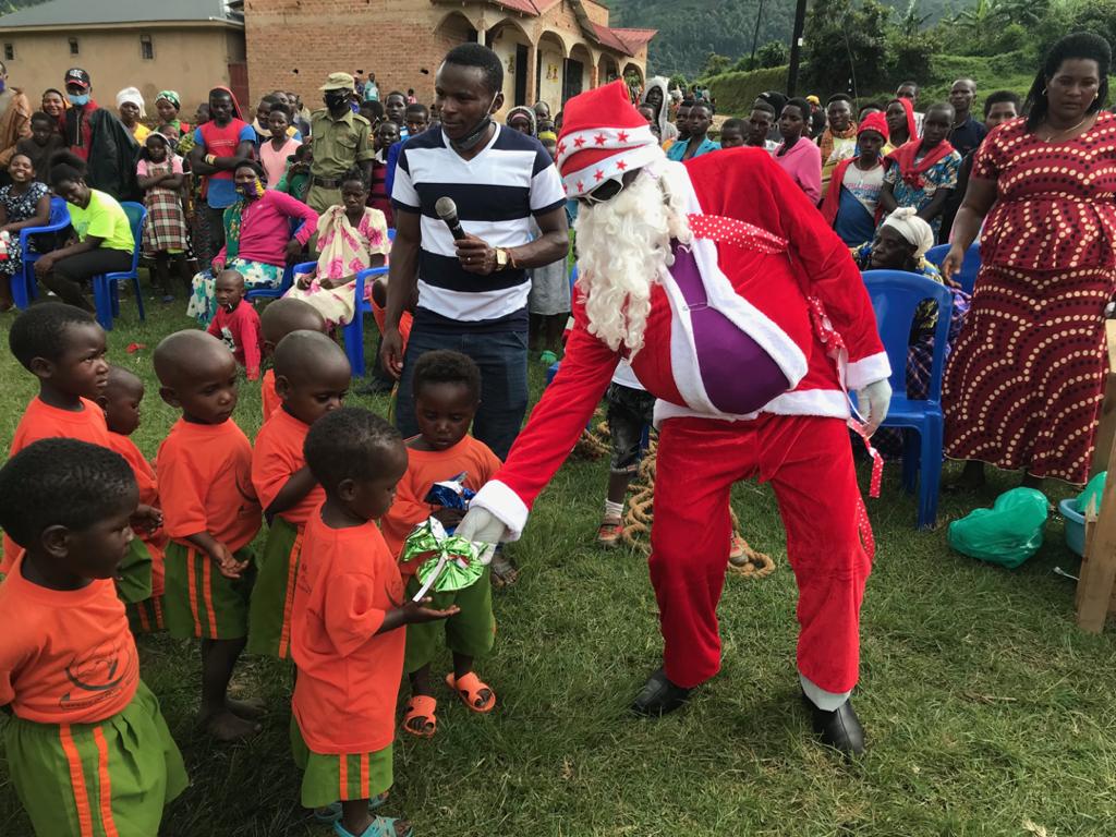 How do Ugandans celebrate Christmas?