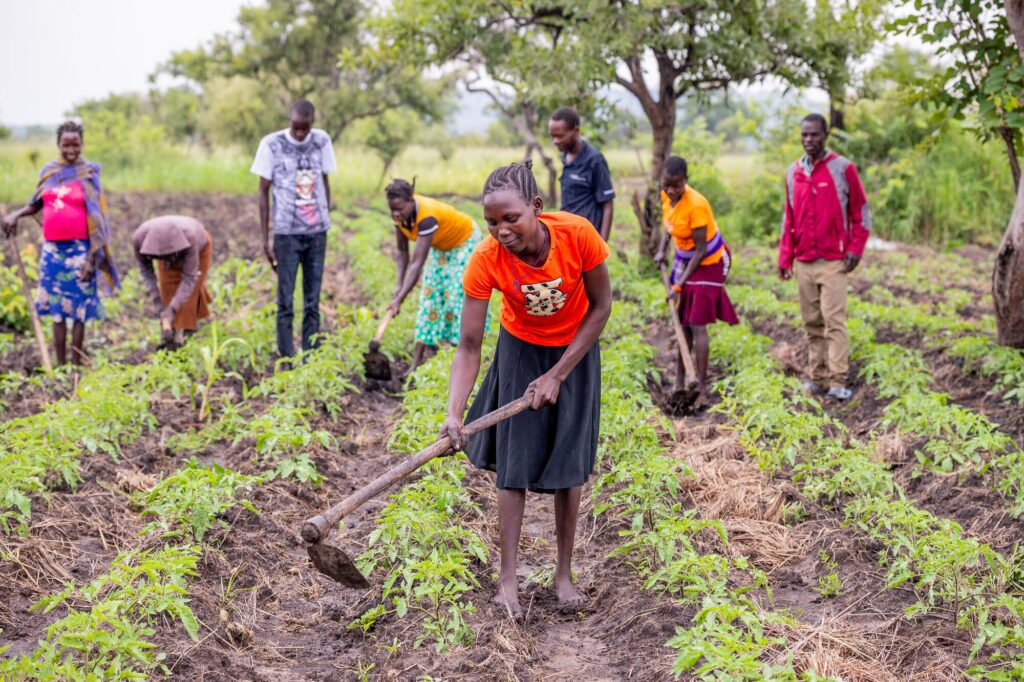 What should I wear when visiting rural Uganda?