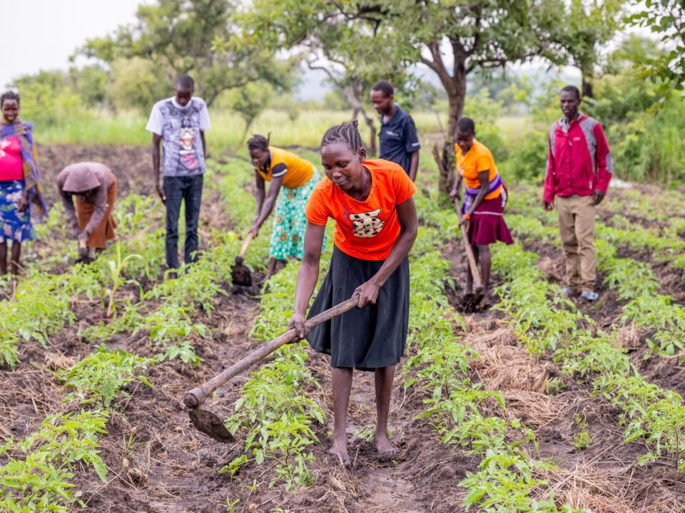 What should I wear when visiting rural Uganda?