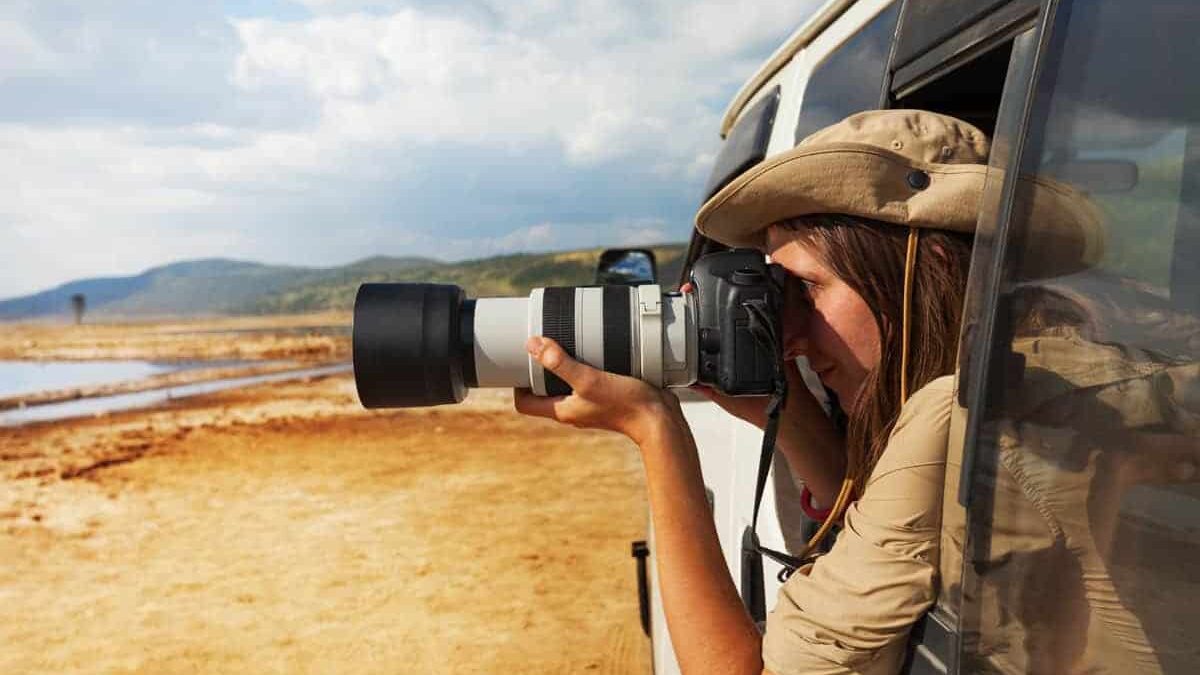 How do I protect my gear from dust during game drives?