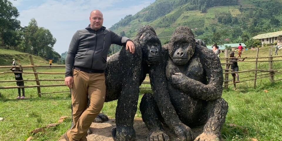 How does Rwanda use gorilla tourism to help conservation?