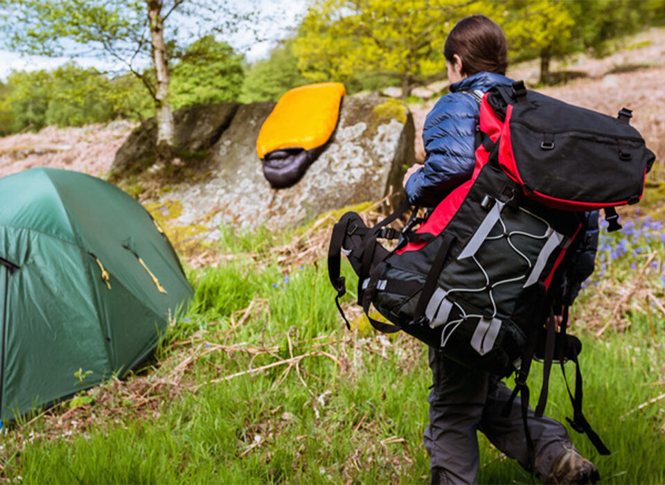 What is the difference between backpacking and hiking?